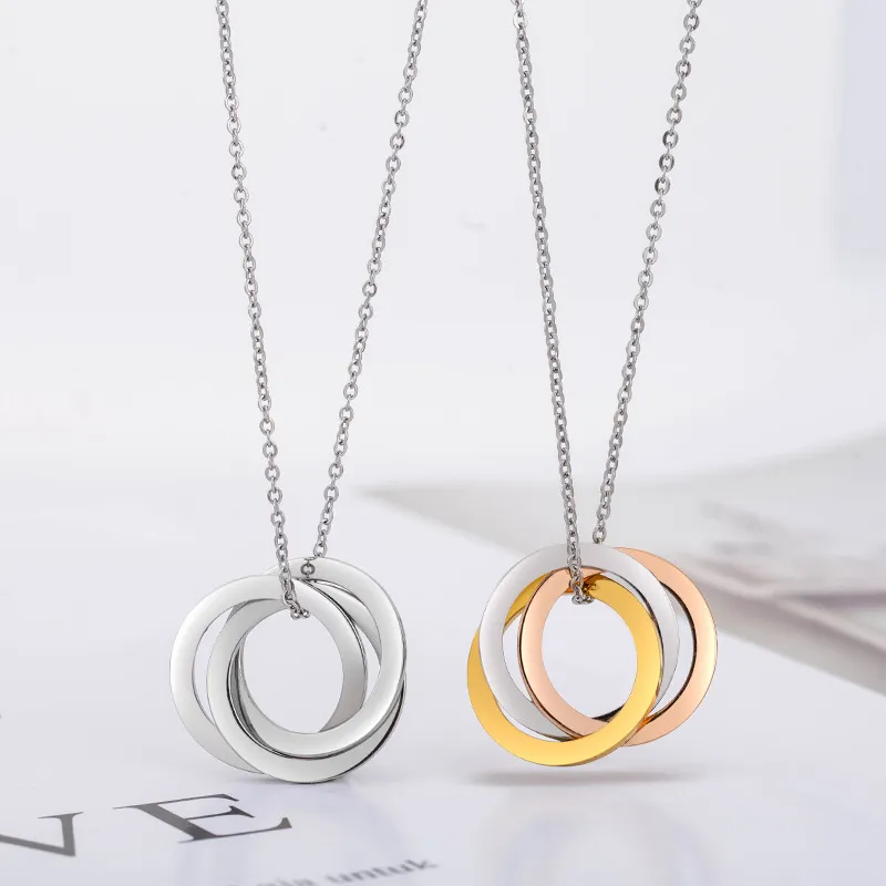Triple Ring Geometric Pendant Necklace