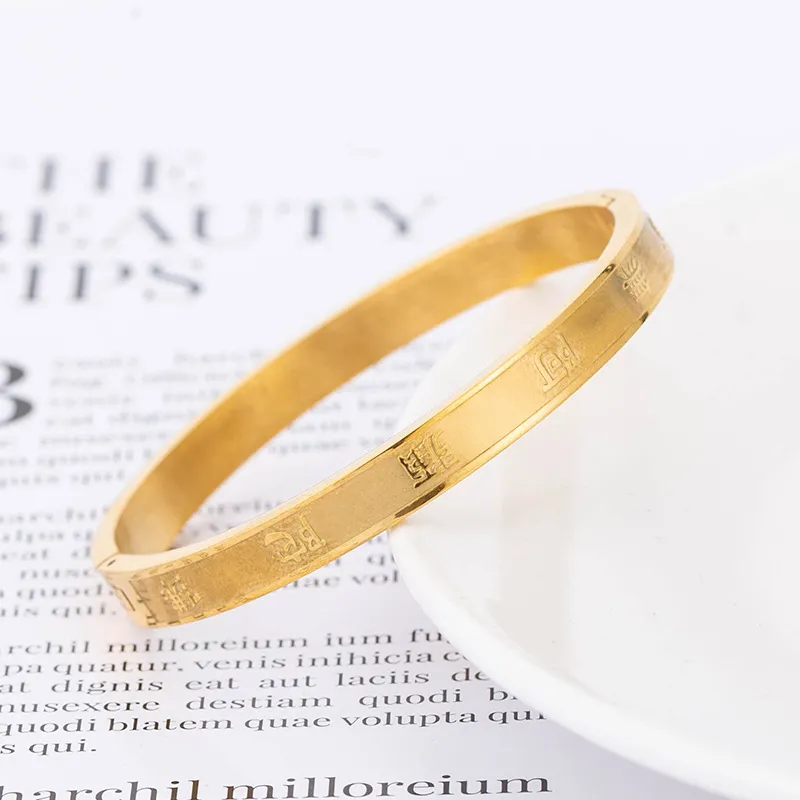 Mantra Engraved Clasp Bangle